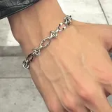 Bracelet chaîne à pointes en acier titane thumbnail 1